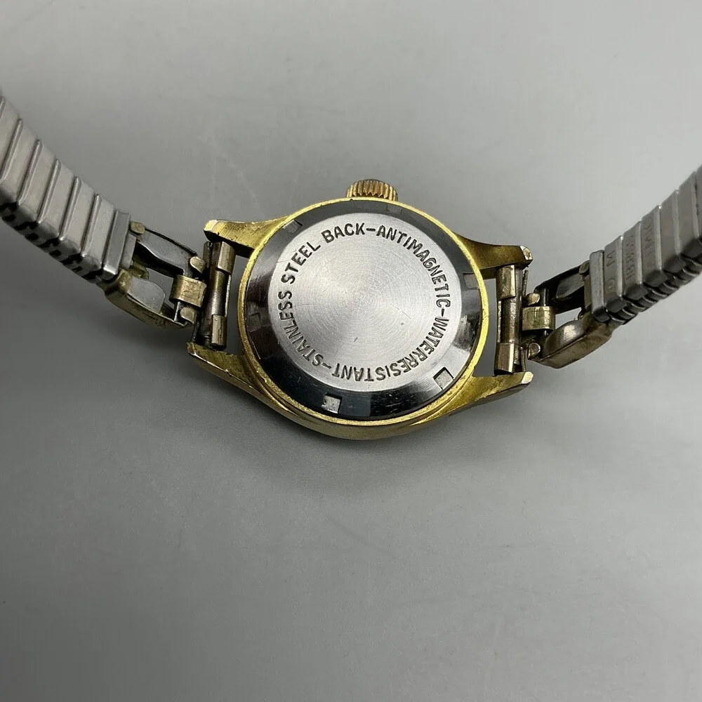 Vintage Genova De Luxe Womens Watch 22mm Gold Tone Stretch Swiss Manual Wind